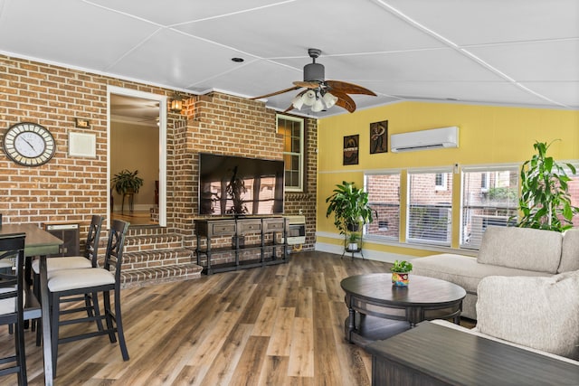 1551 Hutton Pl, Charleston, SC 29407 - living room with a wall mounted air conditioner, ceiling fan, wood finished floors, brick wall, and vaulted ceiling