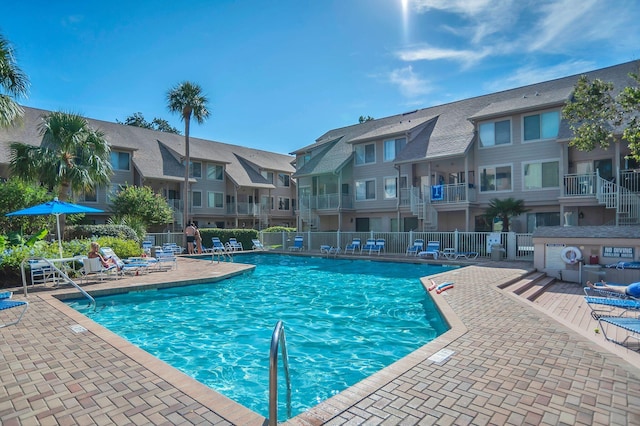 view of swimming pool featuring a patio