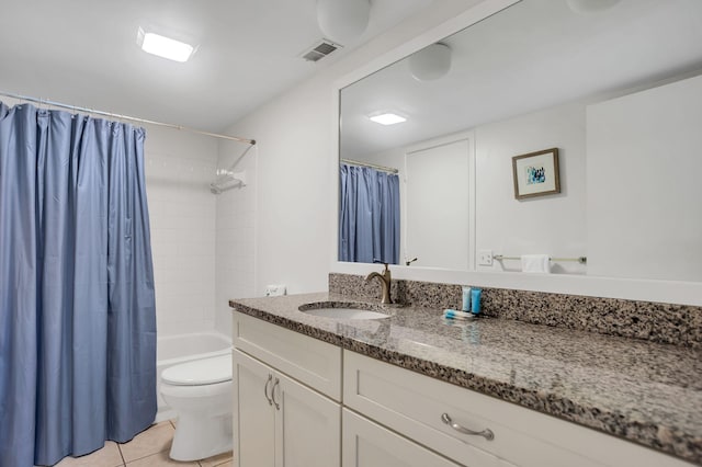 full bathroom featuring tile patterned flooring, vanity, toilet, and shower / bathtub combination with curtain