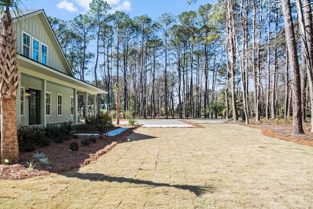 view of yard featuring a porch