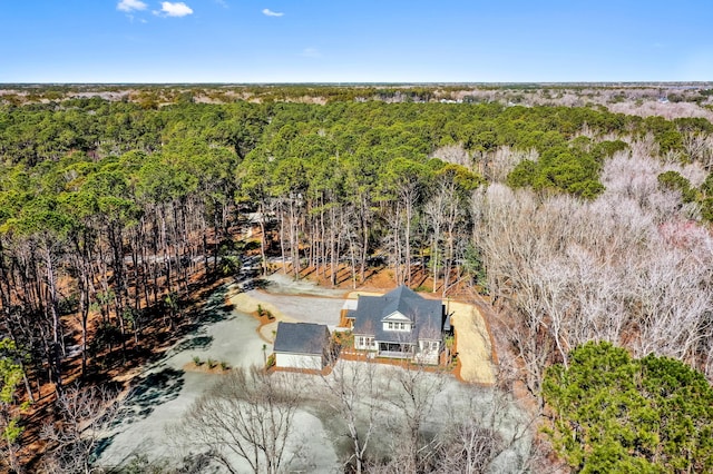 bird's eye view featuring a view of trees