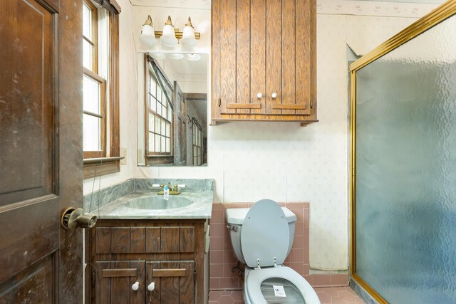 200 Old Postern Rd, Summerville, SC 29483 - full bathroom featuring plenty of natural light, a shower stall, wallpapered walls, and toilet