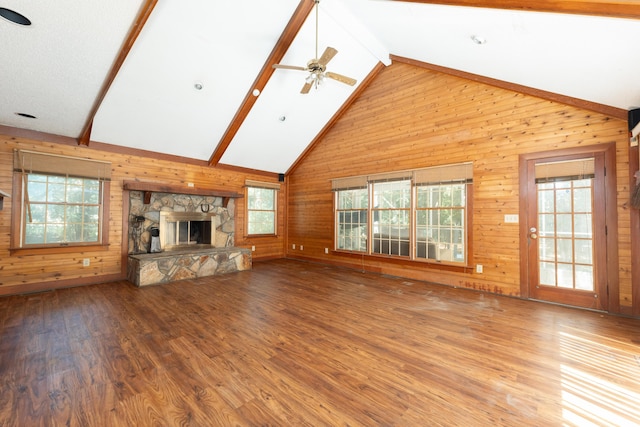 200 Old Postern Rd, Summerville, SC 29483 - unfurnished living room with wood walls, healthy amount of natural light, wood finished floors, a ceiling fan, and a fireplace
