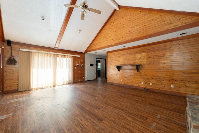 200 Old Postern Rd, Summerville, SC 29483 - unfurnished living room with wood walls, beam ceiling, high vaulted ceiling, a ceiling fan, and wood finished floors