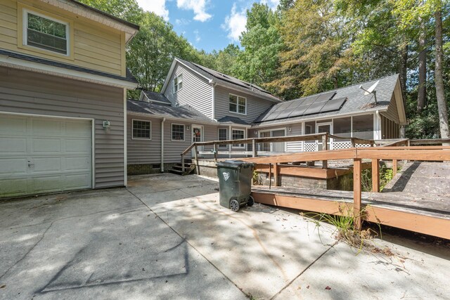 200 Old Postern Rd, Summerville, SC 29483 - rear view of house with a deck, a sunroom, and a garage