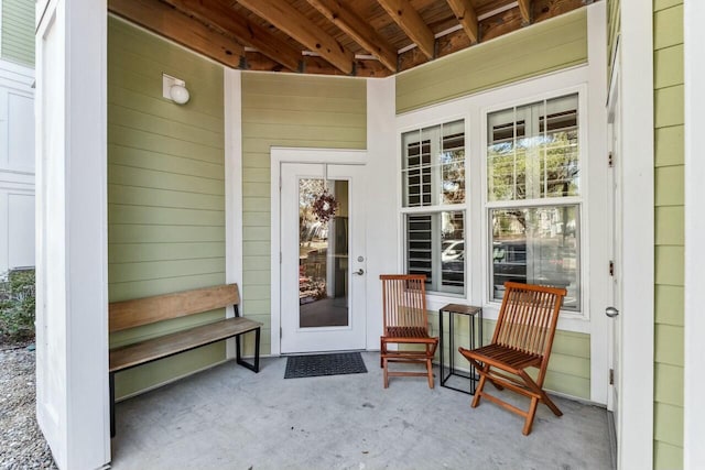 entrance to property with a porch