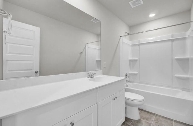 full bathroom featuring visible vents, shower / bathing tub combination, toilet, vanity, and tile patterned flooring