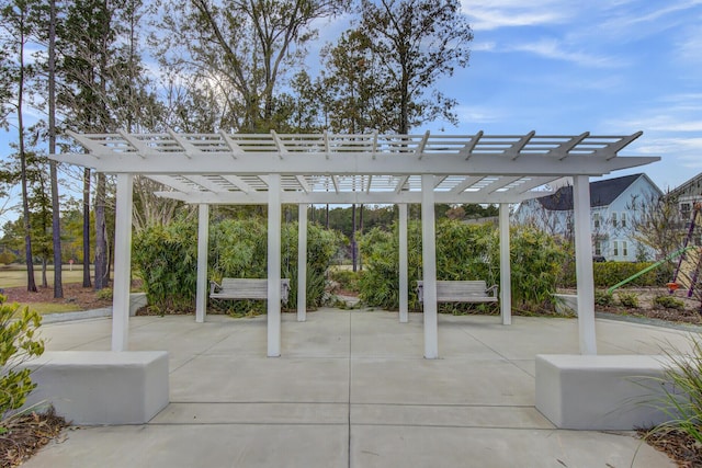 view of patio featuring a pergola