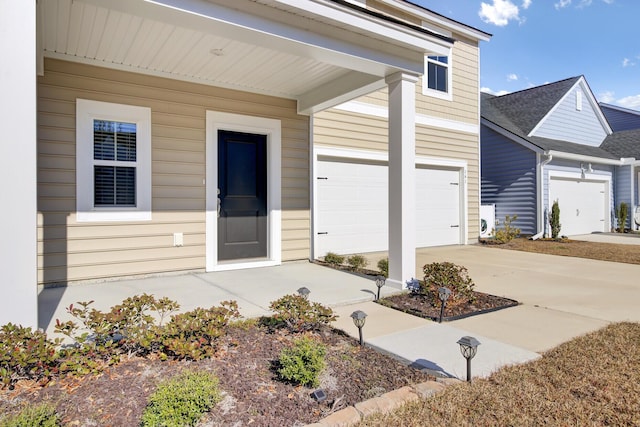 property entrance featuring driveway