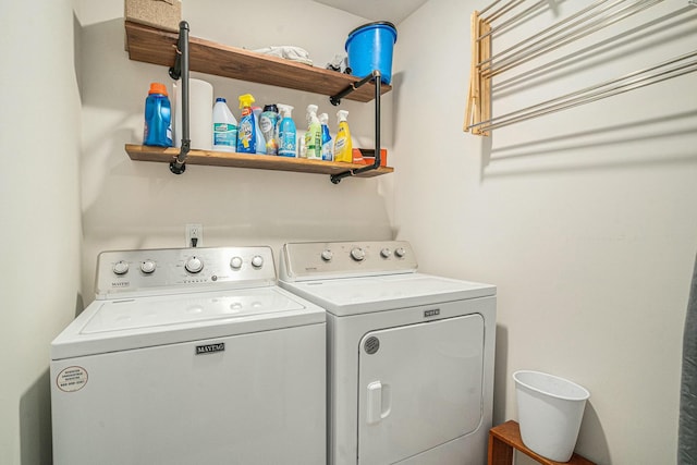 laundry area with independent washer and dryer