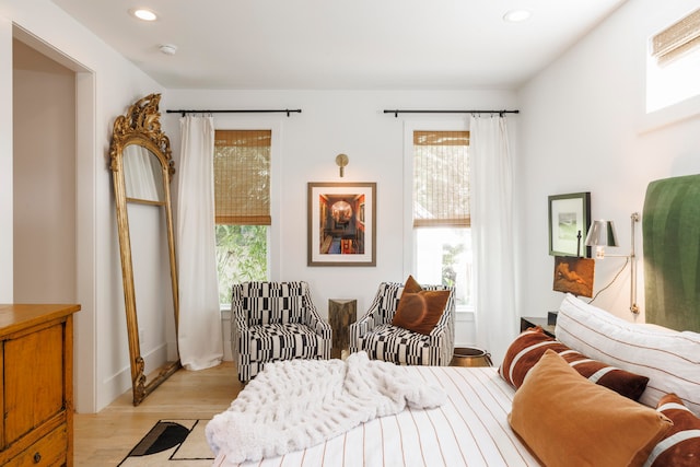 bedroom with light hardwood / wood-style floors