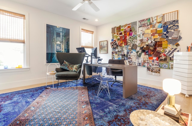 home office featuring ceiling fan and hardwood / wood-style floors