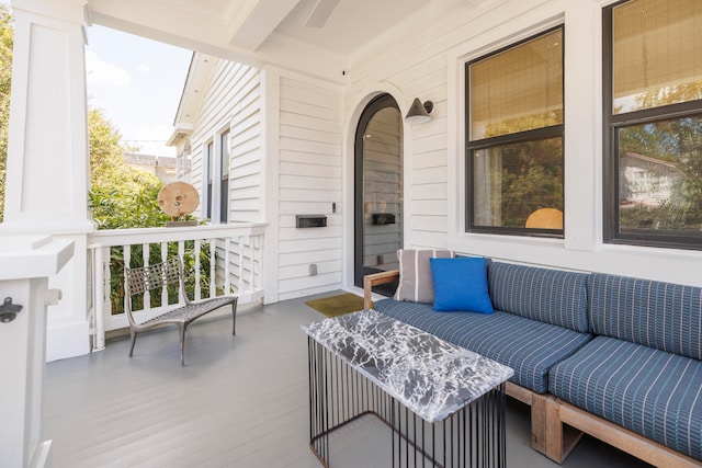 wooden terrace with a porch