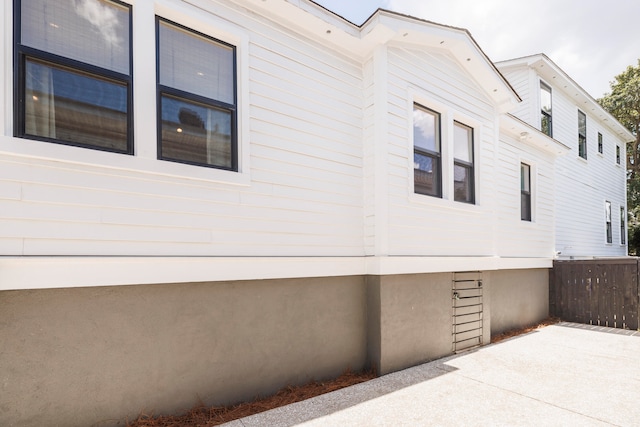 view of side of property featuring a patio