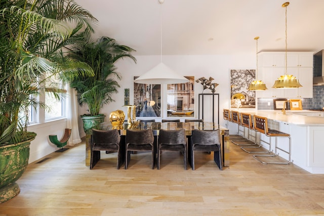 dining room featuring light hardwood / wood-style floors