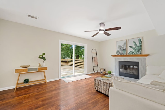 8112 Halifax Way N, Charleston, SC 29420 - living area featuring wood finished floors, ceiling fan, and a tiled fireplace