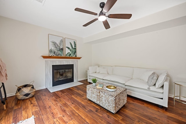 8112 Halifax Way N, Charleston, SC 29420 - living room with a tile fireplace, a ceiling fan, and wood finished floors