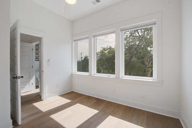 4067 S Rhett Ave, North Charleston, SC 29405 - unfurnished room with wood finished floors, baseboards, and ceiling fan