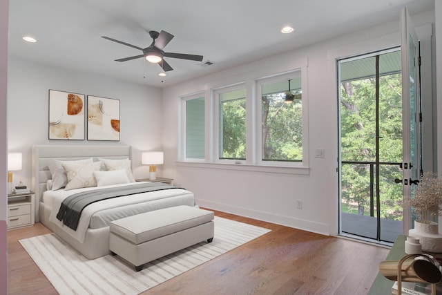 4067 S Rhett Ave, North Charleston, SC 29405 - bedroom featuring access to outside, multiple windows, wood finished floors, recessed lighting, and baseboards