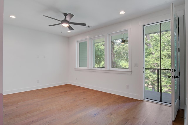 4067 S Rhett Ave, North Charleston, SC 29405 - empty room featuring plenty of natural light, light wood-type flooring, ceiling fan, baseboards, and recessed lighting