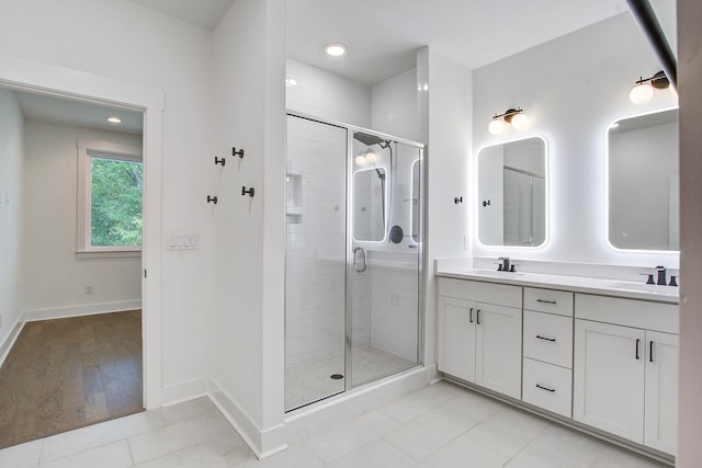 4067 S Rhett Ave, North Charleston, SC 29405 - full bath featuring double vanity, a shower stall, baseboards, tile patterned flooring, and recessed lighting