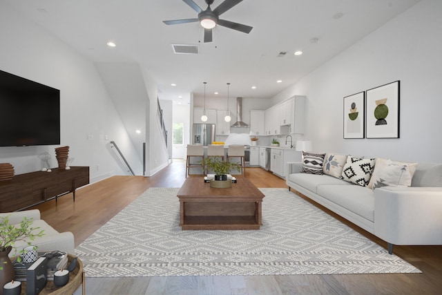 4067 S Rhett Ave, North Charleston, SC 29405 - living area with a ceiling fan, light wood finished floors, and recessed lighting