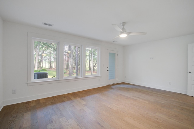 4067 S Rhett Ave, North Charleston, SC 29405 - empty room with baseboards, light wood-type flooring, and ceiling fan