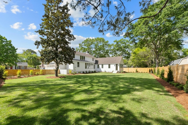 view of yard featuring a garage