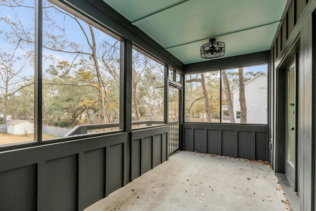 unfurnished sunroom with plenty of natural light