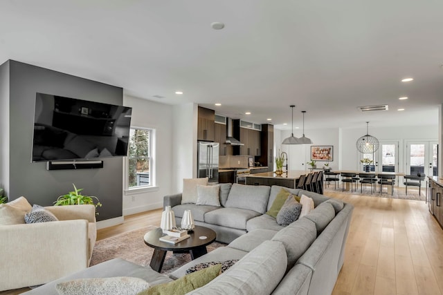 living room featuring light wood-type flooring