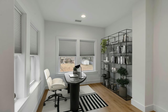 office space featuring light wood-type flooring