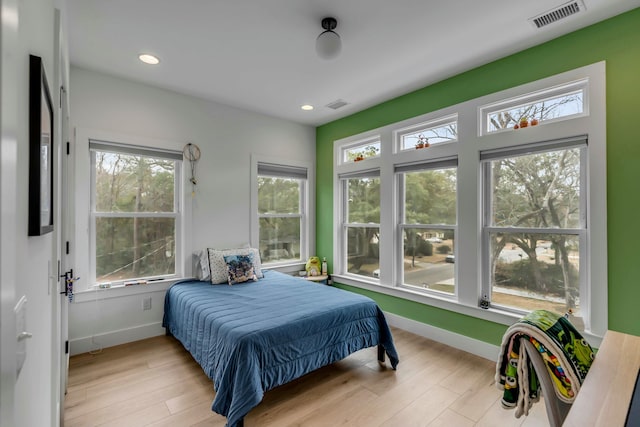 bedroom featuring light wood-type flooring