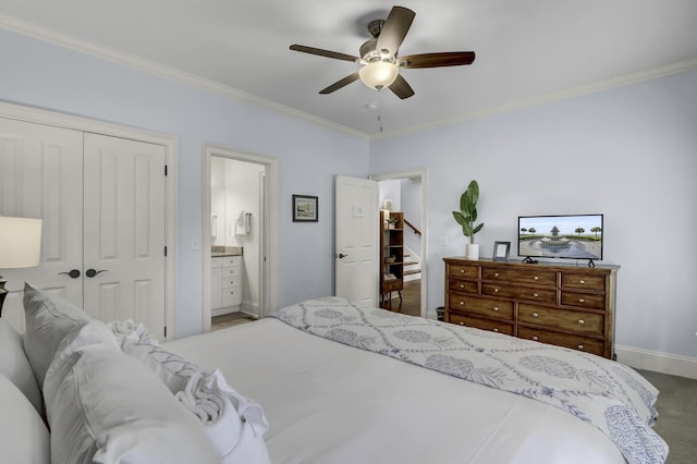 bedroom featuring ensuite bathroom, a closet, ornamental molding, and ceiling fan