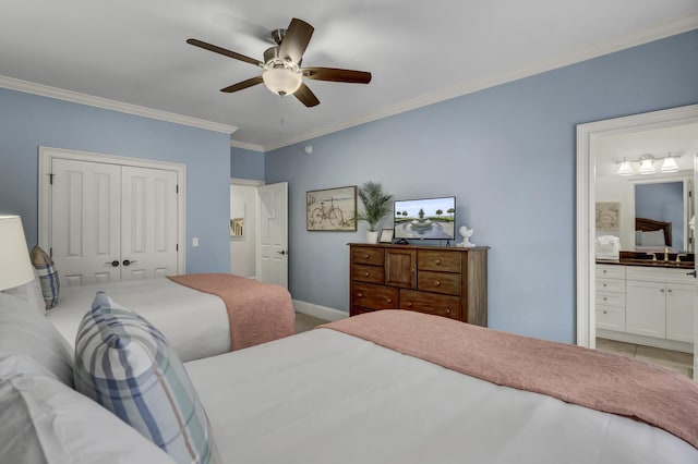 bedroom featuring ceiling fan, ornamental molding, connected bathroom, and a closet