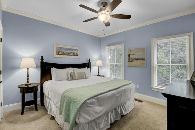 bedroom featuring light colored carpet, ceiling fan, and ornamental molding