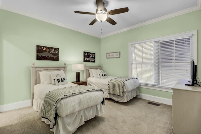 bedroom with ceiling fan, light colored carpet, and ornamental molding