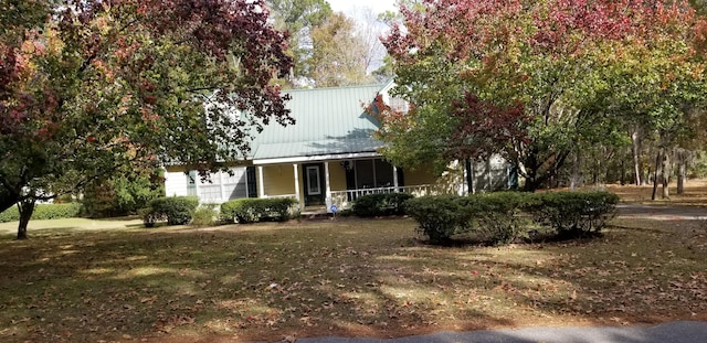 obstructed view of property featuring a porch