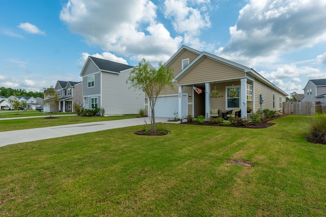 view of front of home featuring a front lawn and a garage