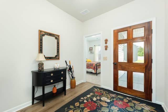 foyer entrance featuring light wood-type flooring