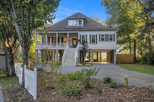 view of front facade with a carport and a porch