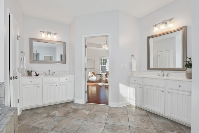 bathroom featuring vanity and wood-type flooring