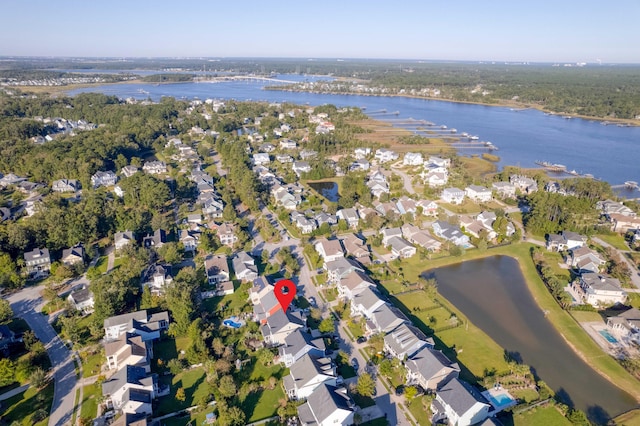 birds eye view of property featuring a water view