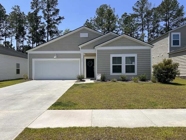 305 Camellia Bloom Dr, Moncks Corner, SC 29461 - view of front facade with an attached garage, concrete driveway, and a front lawn