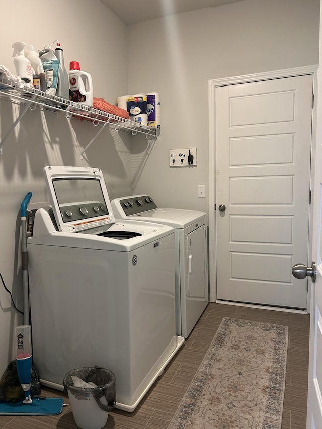305 Camellia Bloom Dr, Moncks Corner, SC 29461 - laundry area with washing machine and dryer and wood tiled floors