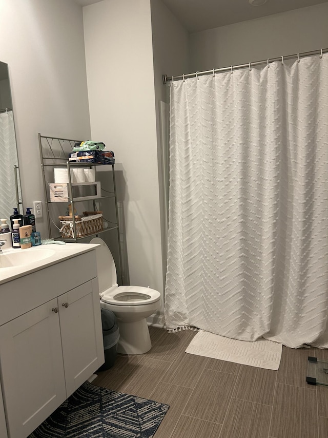 305 Camellia Bloom Dr, Moncks Corner, SC 29461 - bathroom with toilet, vanity, and curtained shower