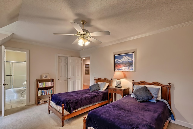 bedroom with light carpet, ensuite bath, a textured ceiling, ceiling fan, and crown molding