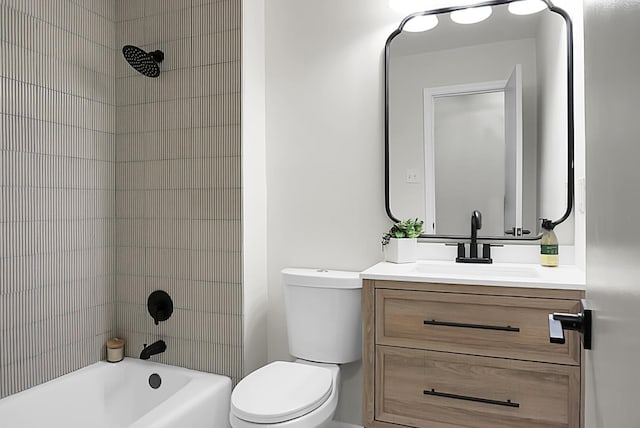 full bathroom featuring vanity, shower / tub combination, and toilet