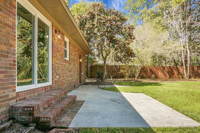 view of yard with a patio area and fence