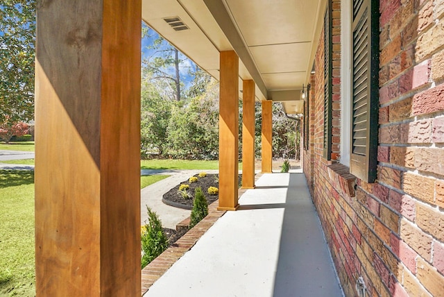 view of patio with visible vents and a porch