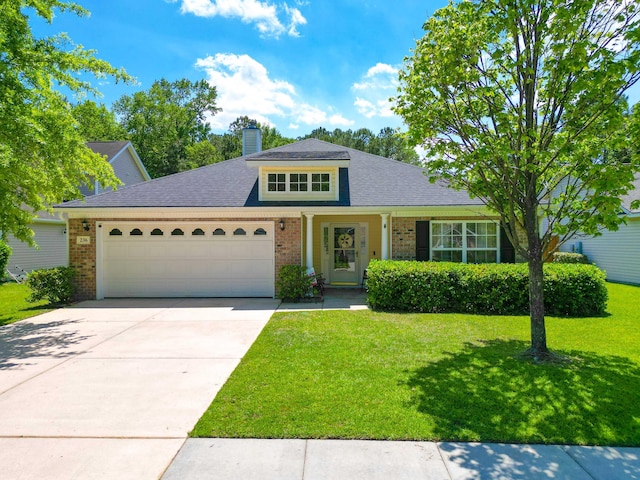view of front of property featuring concrete driveway, brick siding, a front lawn, and a garage